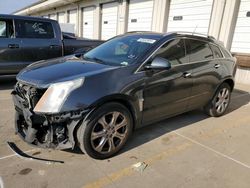 Vehiculos salvage en venta de Copart Louisville, KY: 2014 Cadillac SRX Premium Collection