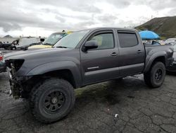 Salvage cars for sale from Copart Colton, CA: 2011 Toyota Tacoma Double Cab