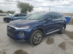 Salvage cars for sale from Copart Orlando, FL: 2019 Hyundai Santa FE SEL
