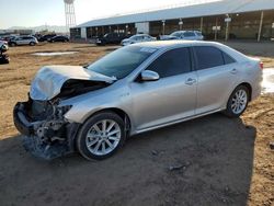 Salvage cars for sale at Phoenix, AZ auction: 2012 Toyota Camry Hybrid