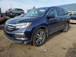 Salvage cars for sale at Woodhaven, MI auction: 2017 Honda Pilot Elite