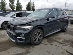 Salvage cars for sale from Copart Rancho Cucamonga, CA: 2018 BMW X1 XDRIVE28I