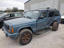 Salvage cars for sale from Copart Apopka, FL: 1999 Jeep Cherokee Sport