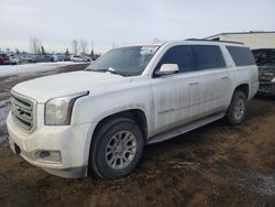 Salvage cars for sale from Copart Rocky View County, AB: 2019 GMC Yukon XL K1500 SLE