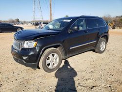 Salvage SUVs for sale at auction: 2011 Jeep Grand Cherokee Laredo