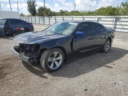 Salvage cars for sale from Copart Miami, FL: 2016 Dodge Charger SE