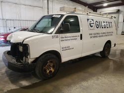 Salvage trucks for sale at Avon, MN auction: 2014 Chevrolet Express G2500