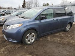 Toyota Sienna LE salvage cars for sale: 2014 Toyota Sienna LE