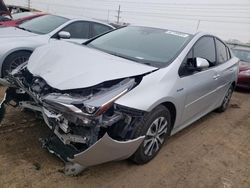 Salvage cars for sale at Elgin, IL auction: 2021 Toyota Prius LE