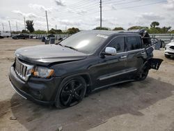 Salvage cars for sale from Copart Miami, FL: 2011 Jeep Grand Cherokee Overland