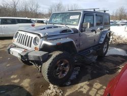 Salvage cars for sale from Copart Marlboro, NY: 2013 Jeep Wrangler Unlimited Sahara