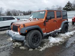 Salvage cars for sale from Copart Grantville, PA: 2011 Jeep Wrangler Unlimited Sport