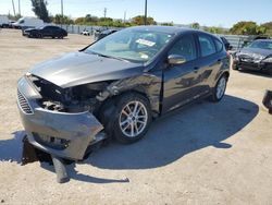 Salvage cars for sale from Copart Miami, FL: 2017 Ford Focus SE