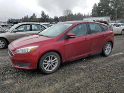Salvage cars for sale from Copart Graham, WA: 2015 Ford Focus SE