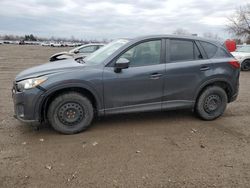 Salvage cars for sale from Copart London, ON: 2015 Mazda CX-5 Sport