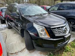 Carros dañados por inundaciones a la venta en subasta: 2013 Cadillac SRX Luxury Collection