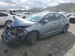 Salvage cars for sale from Copart Colton, CA: 2022 Toyota Corolla SE