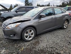 Salvage cars for sale from Copart Graham, WA: 2013 Ford Focus SE