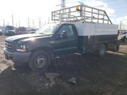 Salvage trucks for sale at Elgin, IL auction: 2002 Ford F350 Super Duty