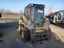 Salvage trucks for sale at Moraine, OH auction: 2011 New Holland Skidloader