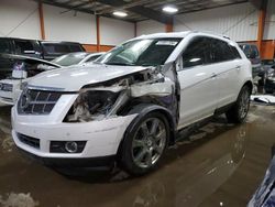 Salvage cars for sale from Copart Rocky View County, AB: 2011 Cadillac SRX Performance Collection