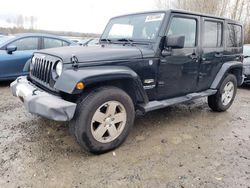 Salvage cars for sale at Arlington, WA auction: 2012 Jeep Wrangler Unlimited Sahara