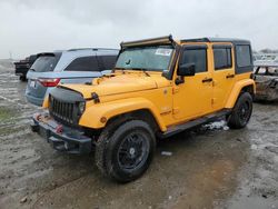 Salvage cars for sale from Copart Sacramento, CA: 2012 Jeep Wrangler Unlimited Sahara