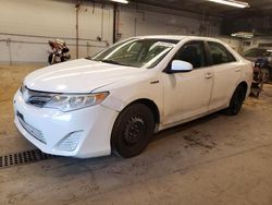 Salvage cars for sale from Copart Wheeling, IL: 2013 Toyota Camry Hybrid