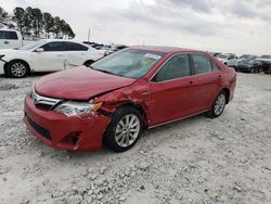 Salvage cars for sale from Copart Loganville, GA: 2014 Toyota Camry Hybrid