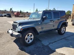 Jeep Wrangler salvage cars for sale: 2014 Jeep Wrangler Unlimited Sahara