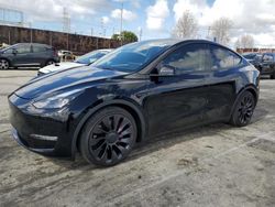 Carros dañados por inundaciones a la venta en subasta: 2022 Tesla Model Y