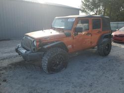 Salvage cars for sale from Copart Midway, FL: 2010 Jeep Wrangler Unlimited Sport