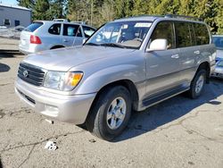Salvage cars for sale from Copart Arlington, WA: 2002 Toyota Land Cruiser