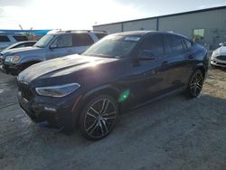 Carros dañados por inundaciones a la venta en subasta: 2021 BMW X6 M50I