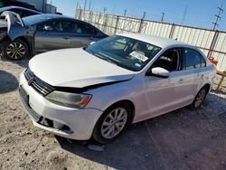 Salvage cars for sale from Copart Haslet, TX: 2013 Volkswagen Jetta SE