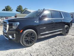 Salvage SUVs for sale at auction: 2021 GMC Yukon XL K1500 SLT