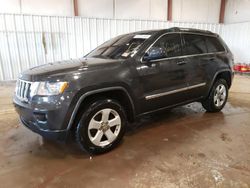 Vehiculos salvage en venta de Copart Lansing, MI: 2011 Jeep Grand Cherokee Laredo