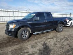 Salvage cars for sale from Copart Bakersfield, CA: 2014 Ford F150 Super Cab