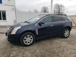Salvage SUVs for sale at auction: 2014 Cadillac SRX