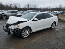 Salvage cars for sale from Copart Marlboro, NY: 2012 Toyota Camry Hybrid