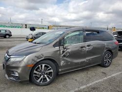 Honda Odyssey salvage cars for sale: 2018 Honda Odyssey Elite