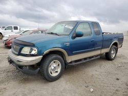 Salvage trucks for sale at Earlington, KY auction: 2000 Ford F150