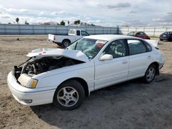 Salvage cars for sale from Copart Bakersfield, CA: 1999 Toyota Avalon XL