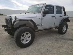 Salvage cars for sale at Adelanto, CA auction: 2012 Jeep Wrangler Unlimited Sport