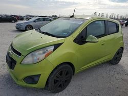 Salvage cars for sale at Houston, TX auction: 2013 Chevrolet Spark 1LT