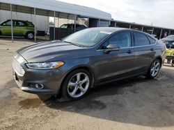 Salvage cars for sale at Fresno, CA auction: 2015 Ford Fusion SE