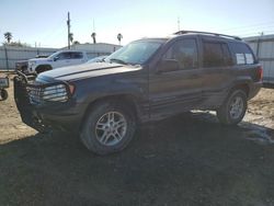 Salvage cars for sale from Copart Mercedes, TX: 2004 Jeep Grand Cherokee Laredo