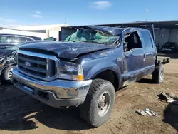 Salvage trucks for sale at Brighton, CO auction: 2002 Ford F250 Super Duty