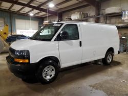 Salvage trucks for sale at Eldridge, IA auction: 2021 Chevrolet Express G2500