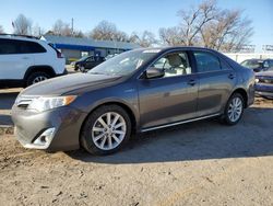 Salvage cars for sale from Copart Wichita, KS: 2014 Toyota Camry Hybrid